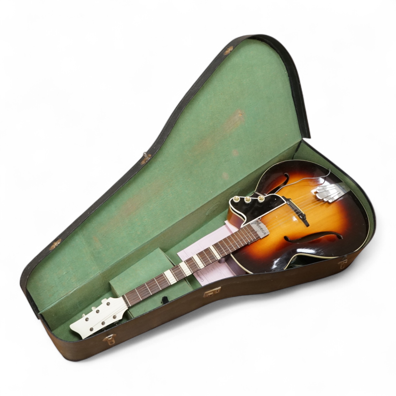 A 1950's Hofner style cut-away acoustic guitar, fitted with a pick up bearing Hofner engraved signature, with hard case.